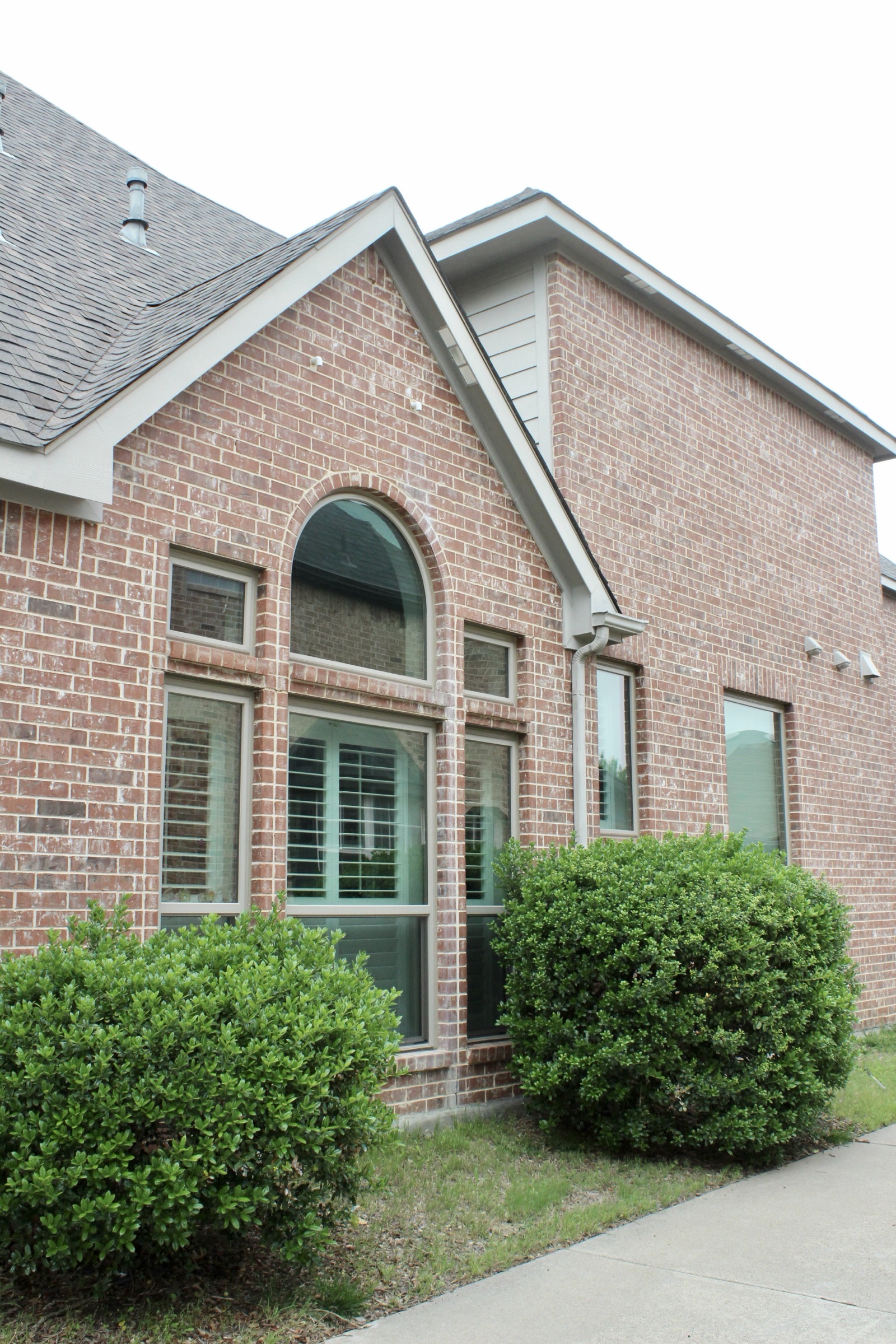 Blue Texas home with replacement windows