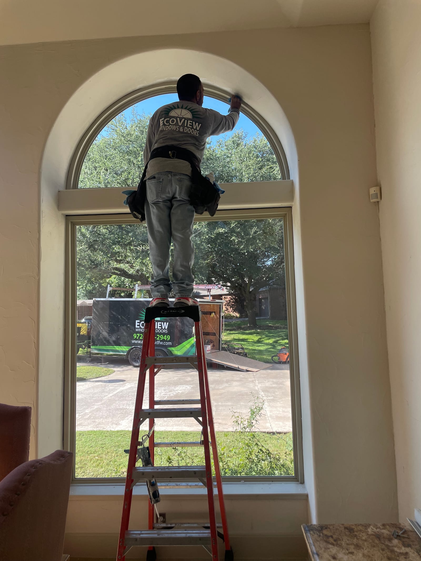 EcoView installer completing an arched window installation