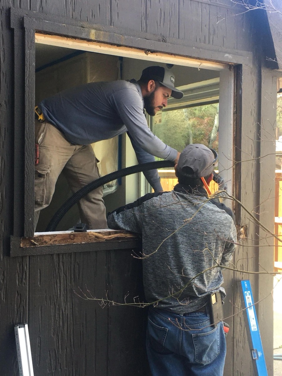Window installers working on a Dallas-Fort Worth home