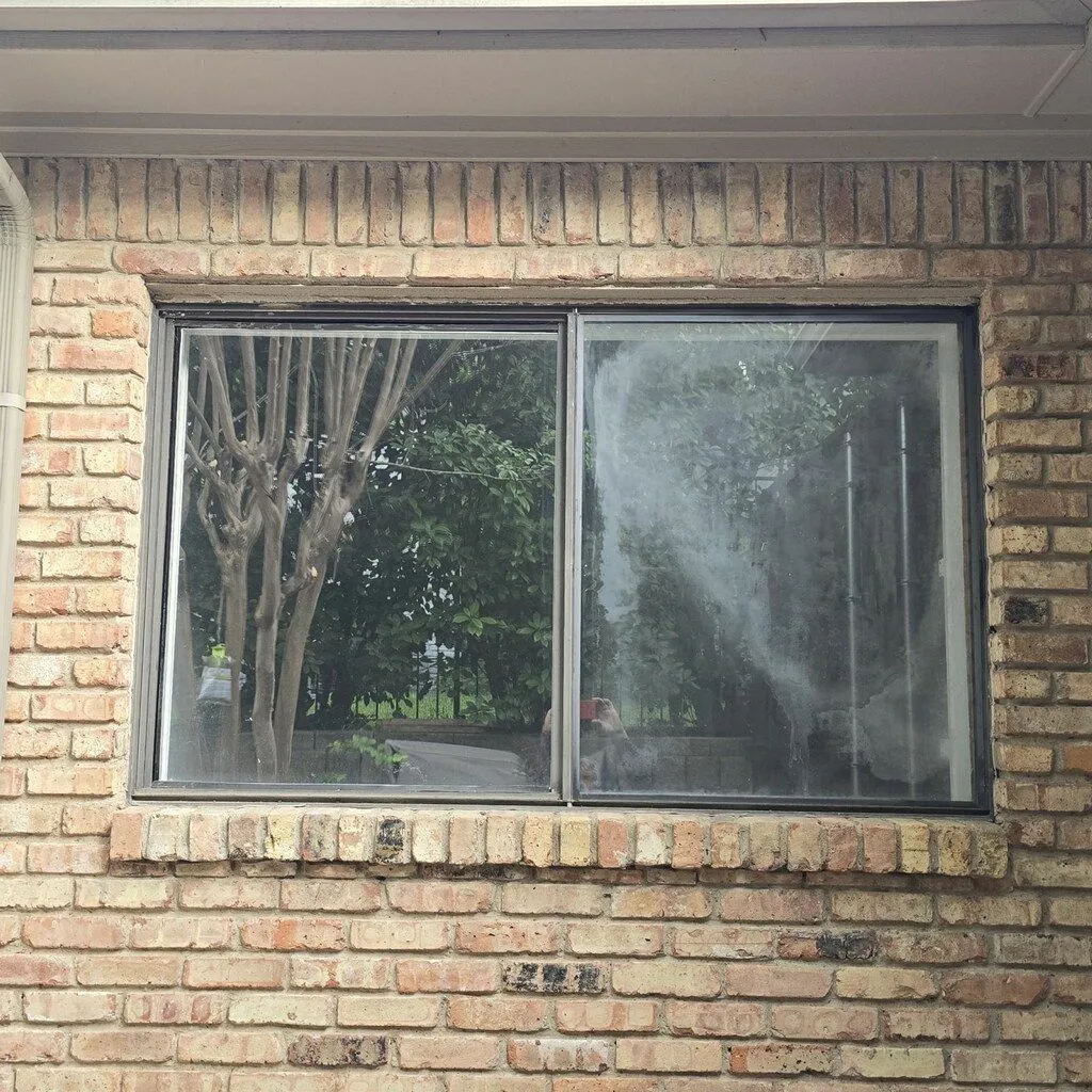 Older windows on a Texas brick home